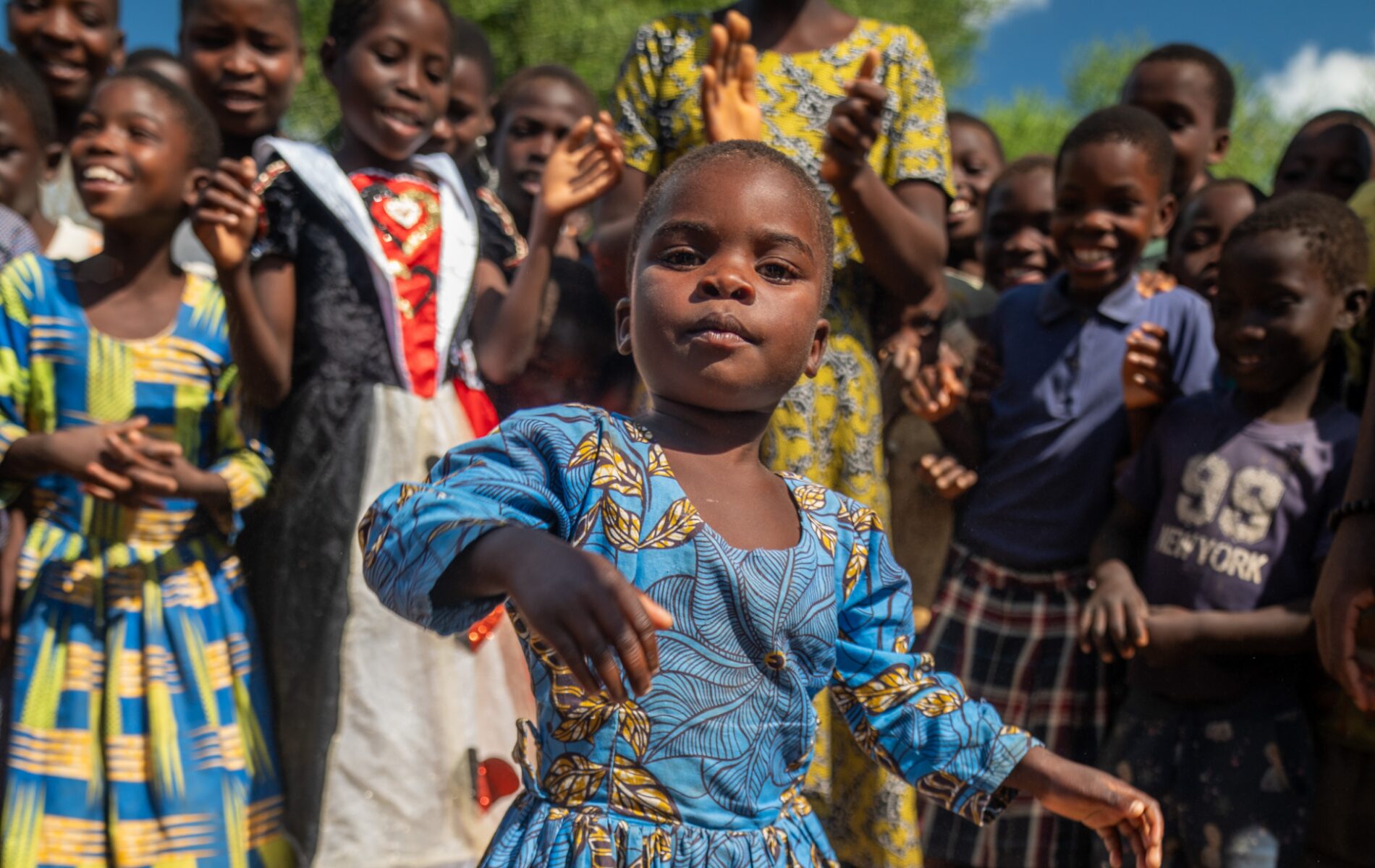 https://d1h8xmz1y5a4ga.cloudfront.net/rhythms-of-change-photo-essay-toddler-in-a-blue-dress-2.jpg